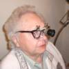 Betty has Macular Degeneration. Here she is testing a trial lens.