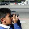 David uses a Telescope for seeing outside signs and objects, and also for boardwork in school.